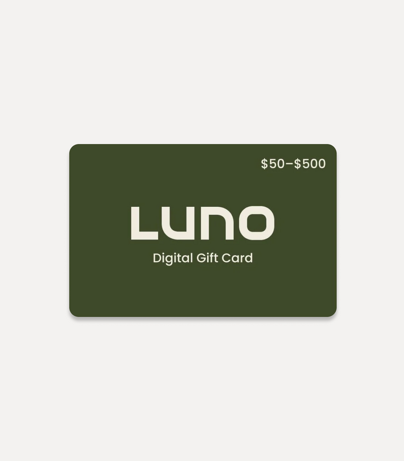 A rectangular digital gift card with a dark green background. The text "LUNO" is centered in large white letters, with "Digital Gift Card" written below it in smaller white letters. The top right corner displays a value range of "$50 - $500" in white text.