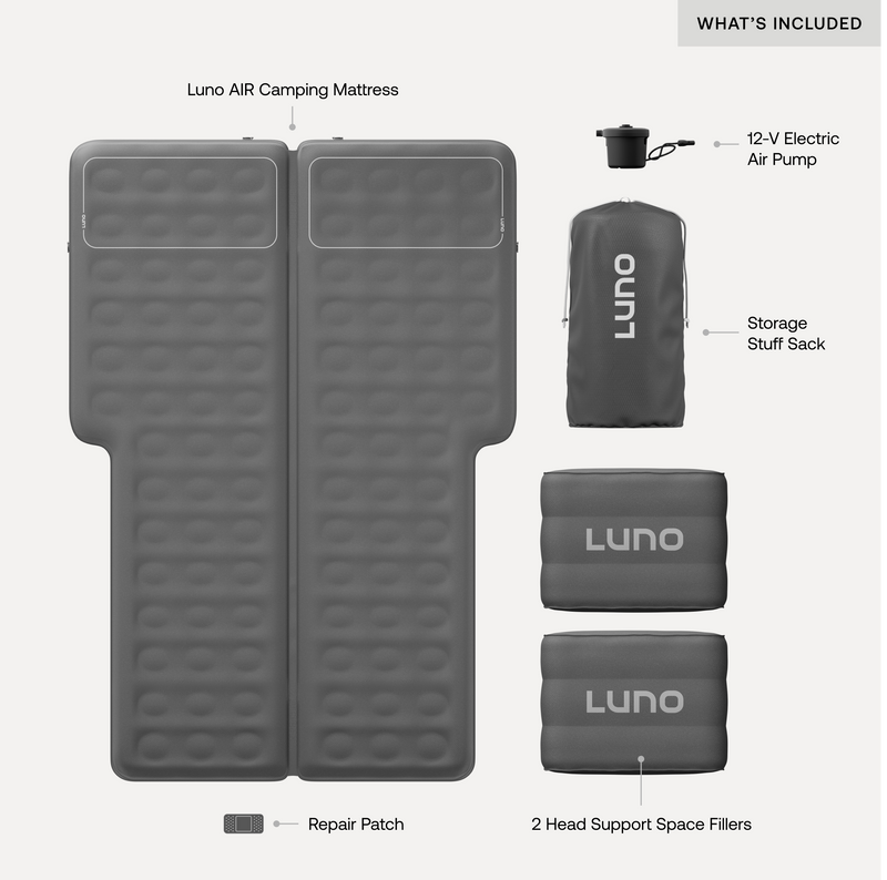 Image of a Luno® AIR Vehicle Mattress and its accessories. The package includes the vehicle mattress made of durable fabric, a 12-V electric air pump for quick setup, a storage stuff sack, a repair patch, and two head support space fillers. Each item is labeled and neatly arranged on a white background.