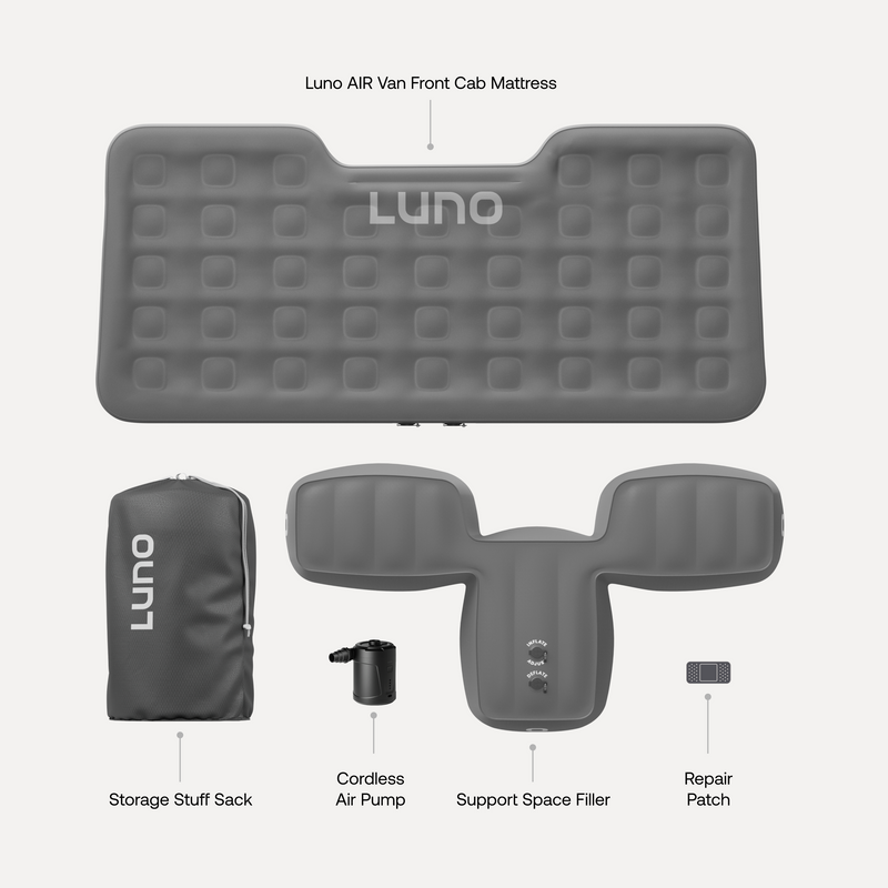 A Luno® AIR Van Front Cab Mattress is displayed along with its components, including a storage stuff sack, cordless air pump, support space fillers, and a repair patch. Constructed from durable fabric and specifically designed for vehicle use, the mattress showcases the Luno® logo on both the mattress and the stuff sack.