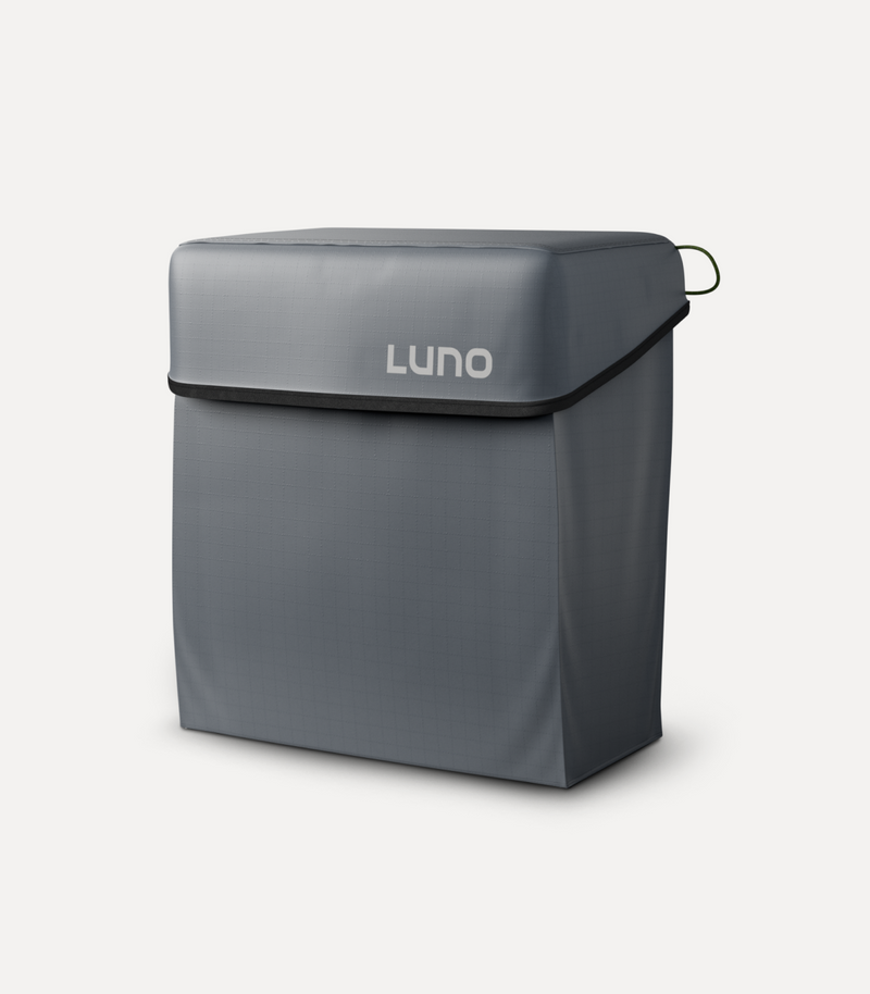 A gray, rectangular storage bag with a flap closure labeled "Luno" in white text on the front. The bag has a sleek and minimalist design, featuring a black edge around the flap. The background is plain white, highlighting the bag's clean lines and modern appearance.