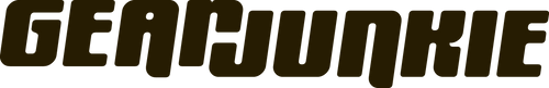 GEARJUNKIE" written in bold, black, uppercase letters with a stylized font. The letters are compact, with some characters joined together, creating a solid, unified look. The background is transparent.
